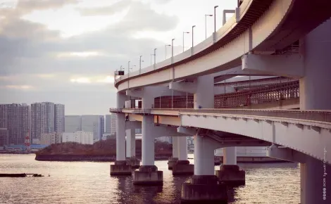 The curves of the Rainbow Bridge in Tokyo offer single points of views of Tokyo.